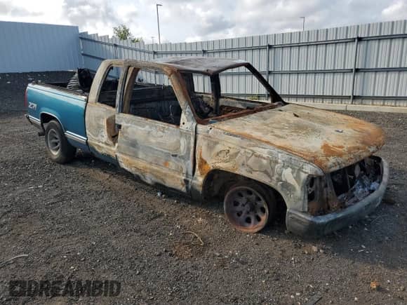 1997 GMC Sierra 1500 z VIN 1GTEC19R5VE506213, wystawiony jako Copart lot #65234385 z przebiegiem Nie podano mil oraz Szkoda całkowita • Salvage title. Historia ofert i sprzedaży dostępna na DreamBid. Obrazek 4.