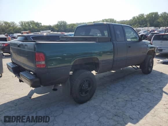 2002 Dodge 2500 with VIN 3B7KF23622M281527, listed as a Copart auction lot 70297065 with 317,620 mi miles and Salvage title. Bid and sale history available at DreamBid. Image 3.