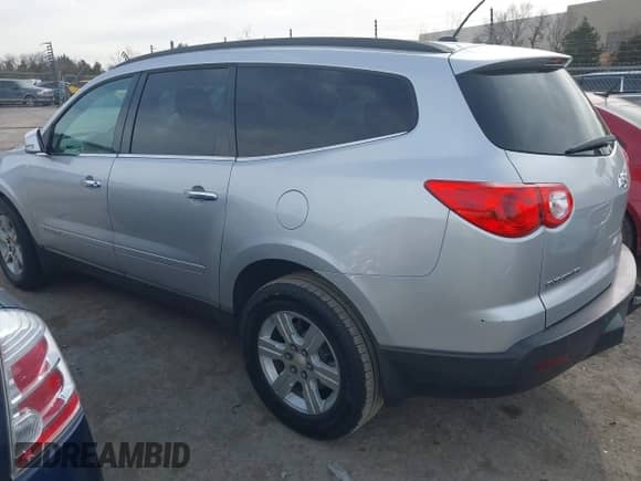 2009 Chevrolet Traverse 2LT z VIN 1GNER23D59S156176, wystawiony jako IAAI lot #41429075 z przebiegiem 166 861 mil mil oraz . Historia ofert i sprzedaży dostępna na DreamBid. Obrazek 3.