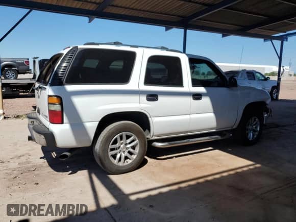 2005 Chevrolet Tahoe LS с VIN 1GNEC13V65J115009, выставлен на аукционе Copart как лот 71090525 с пробегом 188 167 миль миль и Списание • Salvage title. История ставок и продаж доступна на DreamBid. Изображение 3.