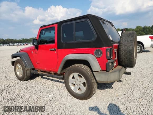 2012 Jeep Wrangler Sport z VIN 1C4AJWAG5CL150964, wystawiony jako Copart lot #81227185 z przebiegiem 211 292 mil mil oraz Szkoda całkowita • Salvage title. Historia ofert i sprzedaży dostępna na DreamBid. Obrazek 2.