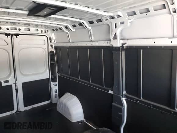 2024 Ram ProMaster Cargo Tradesman с VIN 3C6LRVDG6RE130139, выставлен на аукционе Copart как лот 70050655 с пробегом 17 249 миль миль и Списание • Salvage title. История ставок и продаж доступна на DreamBid. Изображение 11.