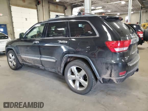 2012 Jeep Grand Cherokee Overland z VIN 1C4RJFCG5CC214050, wystawiony jako Copart lot #66410885 z przebiegiem 137 195 mil mil oraz Szkoda całkowita • Salvage title. Historia ofert i sprzedaży dostępna na DreamBid. Obrazek 2.