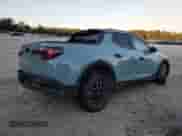 2022 Hyundai Santa Cruz SEL с VIN 5NTJCDAE1NH032013, выставлен на аукционе Copart как лот 76085934 с пробегом 28 824 миль миль и Списание • Salvage title. История ставок и продаж доступна на DreamBid. Изображение 3.