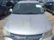 2012 Dodge Journey SXT z VIN 3C4PDCBBXCT354070, wystawiony jako IAAI lot #43211177 z przebiegiem 195 840 mil mil oraz . Historia ofert i sprzedaży dostępna na DreamBid. Obrazek 6.