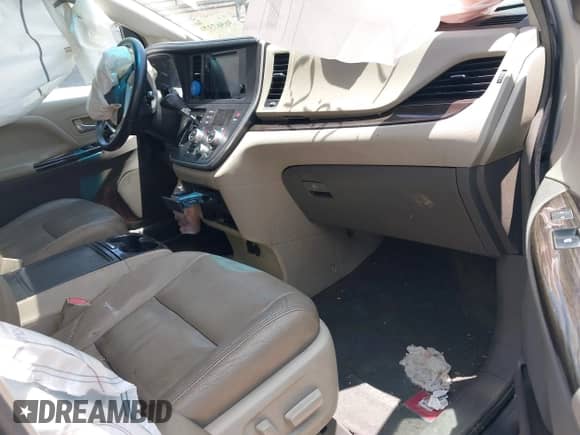 2015 Toyota Sienna XLE with VIN 5TDYK3DC0FS589947, listed as a IAAI auction lot 36567379 with 130,969 mi miles and . Bid and sale history available at DreamBid. Image 5.