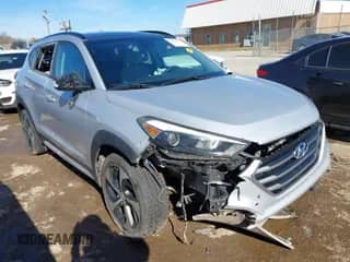 2017 Hyundai Tucson Sport with VIN KM8J33A21HU580324, listed as a IAAI auction lot 41651502 with 128,435 mi miles and . Bid and sale history available at DreamBid. Image 1.