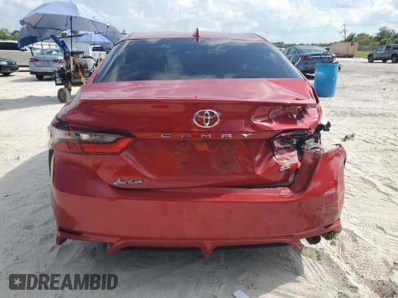 2023 Toyota Camry SE z VIN 4T1G11AK7PU120197, wystawiony jako Copart lot #69823055 z przebiegiem 55 573 mil mil oraz Szkoda całkowita • Salvage title. Historia ofert i sprzedaży dostępna na DreamBid. Obrazek 6.