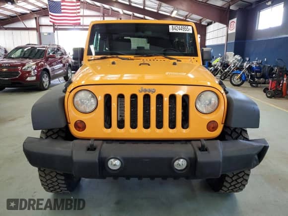 2012 Jeep Wrangler Sport z VIN 1C4AJWAG7CL166907, wystawiony jako Copart lot #84244955 z przebiegiem 427 224 mil mil oraz Czysty tytuł • Clean title. Historia ofert i sprzedaży dostępna na DreamBid. Obrazek 5.