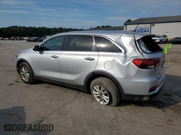 2019 Kia Sorento L with VIN 5XYPG4A35KG472847, listed as a Copart auction lot 70553065 with 168,022 mi miles and Salvage title. Bid and sale history available at DreamBid. Image 2.