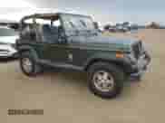 1995 Jeep Wrangler Sahara with VIN 1J4FY49S3SP264977, listed as a Copart auction lot 60938014 with 681 mi miles and Clean title. Bid and sale history available at DreamBid. Image 4.