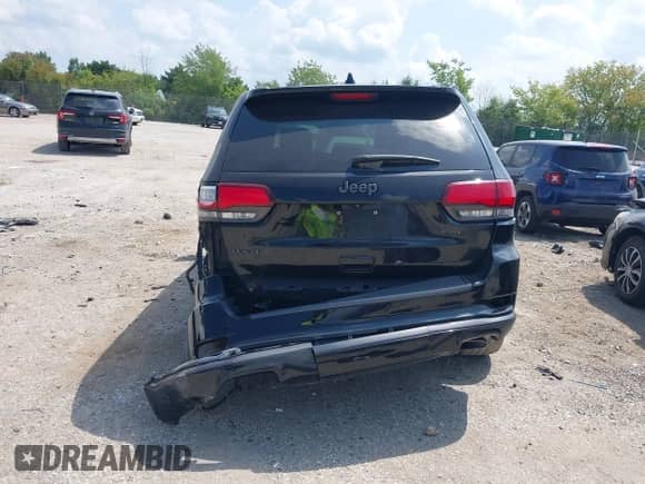 2018 Jeep Grand Cherokee Overland with VIN 1C4RJFCG9JC357564, listed as a IAAI auction lot 42902786 with 118,665 mi miles and . Bid and sale history available at DreamBid. Image 16.