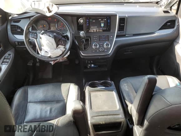 2015 Toyota Sienna SE with VIN 5TDXK3DC0FS567474, listed as a Copart auction lot 80295615 with 93,112 mi miles and Salvage title. Bid and sale history available at DreamBid. Image 8.