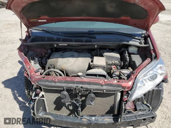 2017 Toyota Sienna LE z VIN 5TDJZ3DC0HS187328, wystawiony jako Copart lot #65073765 z przebiegiem 140 042 mil mil oraz Szkoda całkowita • Salvage title. Historia ofert i sprzedaży dostępna na DreamBid. Obrazek 12.