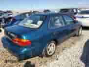 2001 Chevrolet Prizm with VIN 1Y1SK52871Z404151, listed as a Copart auction lot 74320794 with 197,664 mi miles and Salvage title. Bid and sale history available at DreamBid. Image 3.