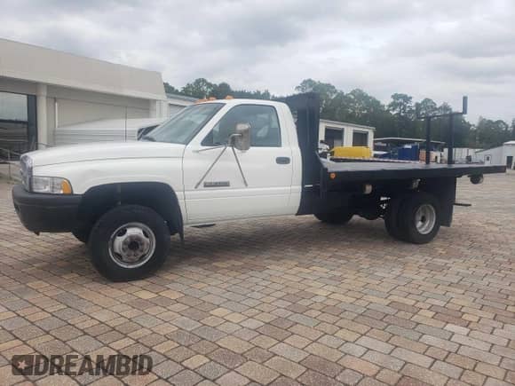 1997 Dodge RAM with VIN 1B6MC36DXVJ534729, listed as a Copart auction lot 63062525 with 301,361 mi miles and Clean title. Bid and sale history available at DreamBid. Image 2.