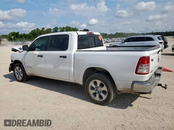 2023 Ram 1500 Lone Star with VIN 1C6SRFFT1PN692860, listed as a Copart auction lot 67404305 with 57,407 mi miles and Salvage title. Bid and sale history available at DreamBid. Image 2.
