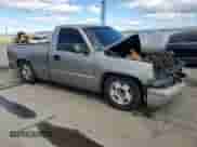 2000 Chevrolet Silverado 1500 with VIN 1GCEC14V5YZ302142, listed as a Copart auction lot 86824055 with 348,622 mi miles and Salvage title. Bid and sale history available at DreamBid. Image 4.