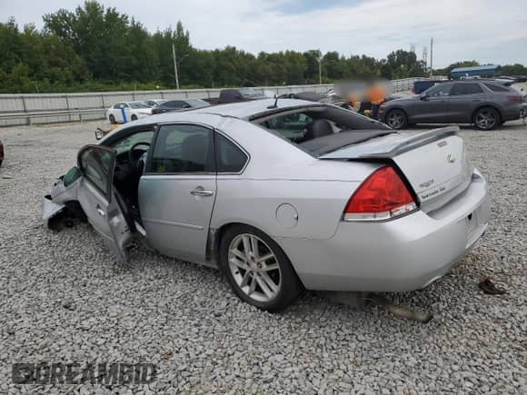 2012 Chevrolet Impala LTZ with VIN 2G1WC5E38C1316393, listed as a Copart auction lot 70455125 with 90,528 mi miles and Salvage title. Bid and sale history available at DreamBid. Image 2.