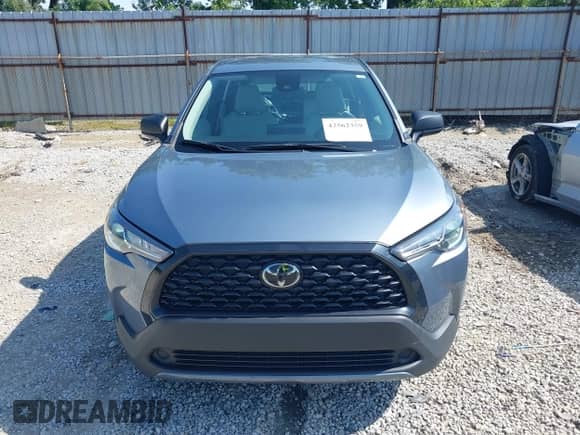 2022 Toyota Corolla Cross L with VIN 7MUAAABGXNV035110, listed as a IAAI auction lot 42562359 with 17,106 mi miles and . Bid and sale history available at DreamBid. Image 13.