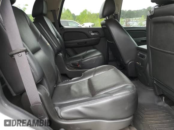 2013 Chevrolet Tahoe LTZ с VIN 1GNSCCE06DR339834, выставлен на аукционе Copart как лот 65712555 с пробегом 174 847 миль миль и На запчасти • Non repairable. История ставок и продаж доступна на DreamBid. Изображение 11.