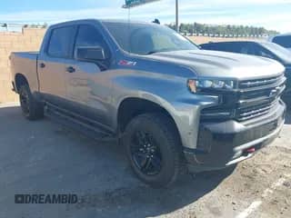 2020 Chevrolet Silverado 1500 LT Trail Boss z VIN 3GCPYFED8LG131487, wystawiony jako IAAI lot #41689549 z przebiegiem 87 474 mil mil oraz . Historia ofert i sprzedaży dostępna na DreamBid. Obrazek 1.