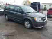 2016 Dodge Grand Caravan SE with VIN 2C4RDGBG1GR154621, listed as a IAAI auction lot 43407585 with 121,271 mi miles and . Bid and sale history available at DreamBid. Image 1.