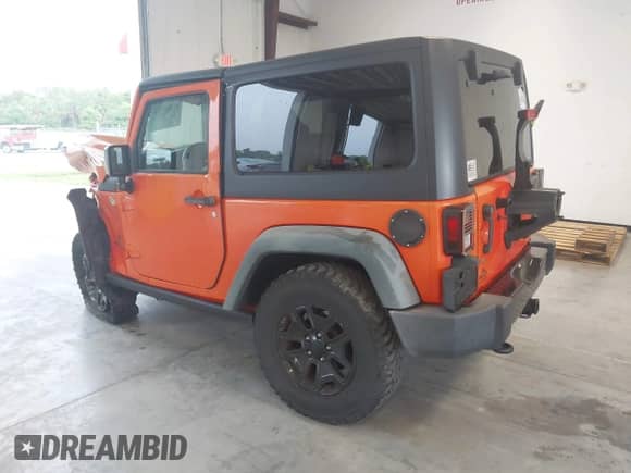 2015 Jeep Wrangler Sport with VIN 1C4AJWAG7FL645882, listed as a IAAI auction lot 42800772 with 54,307 mi miles and . Bid and sale history available at DreamBid. Image 3.