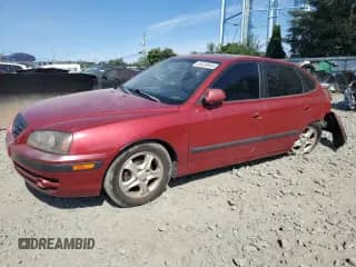 2004 Hyundai Elantra GT z VIN KMHDN56D14U109930, wystawiony jako Copart lot #65430945 z przebiegiem 74 504 mil mil oraz Szkoda całkowita • Salvage title. Historia ofert i sprzedaży dostępna na DreamBid. Obrazek 1.