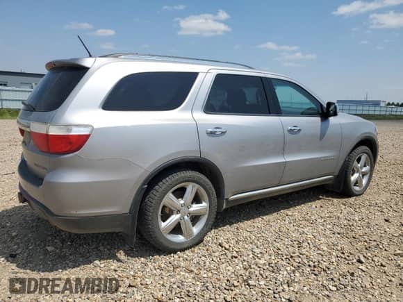2013 Dodge Durango Citadel with VIN 1C4RDJEG7DC687893, listed as a Copart auction lot 61614515 with 163,680 mi miles and Salvage title. Bid and sale history available at DreamBid. Image 3.