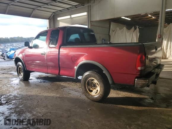 1998 Ford F-150 с VIN 1FTZX186XWNA24450, выставлен на аукционе Copart как лот 85858725 с пробегом 163 158 миль миль и Списание • Salvage title. История ставок и продаж доступна на DreamBid. Изображение 2.