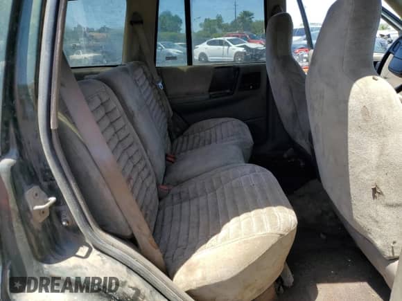 1995 Jeep Grand Cherokee Laredo с VIN 1J4GZ58Y4SC577119, выставлен на аукционе Copart как лот 56115775 с пробегом 236 628 миль миль и Списание • Salvage title. История ставок и продаж доступна на DreamBid. Изображение 10.