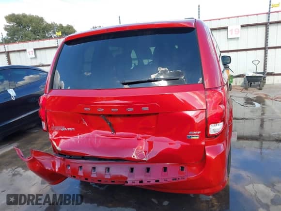 2015 Dodge Grand Caravan SXT with VIN 2C4RDGCG4FR585175, listed as a IAAI auction lot 43407444 with 104,404 mi miles and . Bid and sale history available at DreamBid. Image 17.