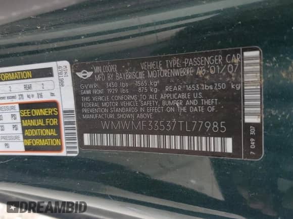 2007 MINI Hardtop with VIN WMWMF33537TL77985, listed as a Copart auction lot 61908635 with 180,470 mi miles and Salvage title. Bid and sale history available at DreamBid. Image 12.