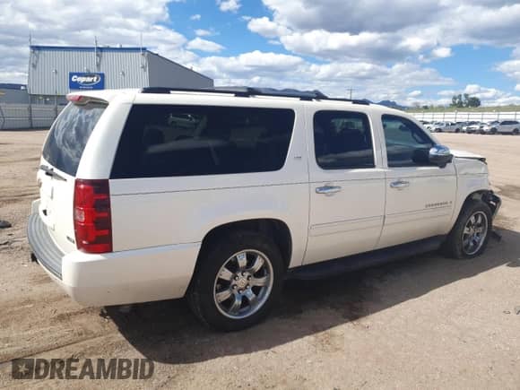 2009 Chevrolet Suburban LTZ with VIN 1GNFK36319R170097, listed as a Copart auction lot 84480485 with 257,990 mi miles and Salvage title. Bid and sale history available at DreamBid. Image 3.