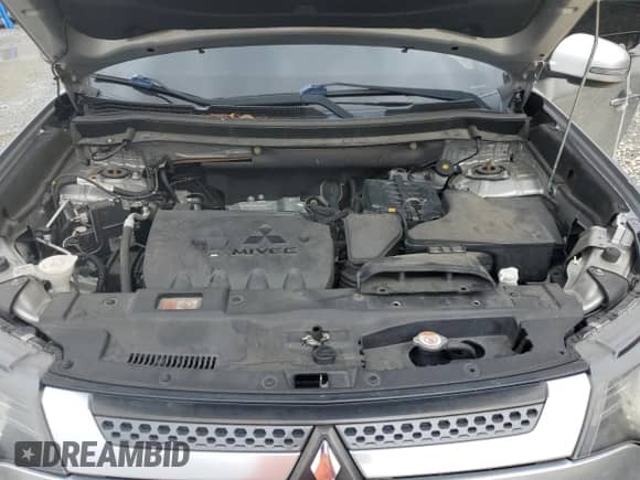 2019 Mitsubishi Outlander ES z VIN JA4AZ3A38KZ026682, wystawiony jako Copart lot #82217935 z przebiegiem 99 115 mil mil oraz Nie do naprawy • Non repairable. Historia ofert i sprzedaży dostępna na DreamBid. Obrazek 11.