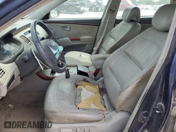 2007 Hyundai Azera SE with VIN KMHFC46F97A218832, listed as a Copart auction lot 66206015 with 201,192 mi miles and Salvage title. Bid and sale history available at DreamBid. Image 7.