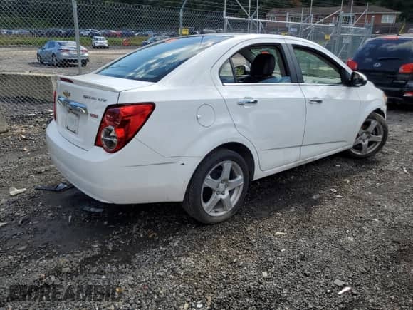 2016 Chevrolet Sonic LTZ with VIN 1G1JE5SB9G4143039, listed as a Copart auction lot 81403265 with 79,849 mi miles and Salvage title. Bid and sale history available at DreamBid. Image 3.