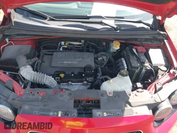 2012 Chevrolet Sonic LT z VIN 1G1JD5SB7C4113759, wystawiony jako IAAI lot #42963002 z przebiegiem 107 837 mil mil oraz . Historia ofert i sprzedaży dostępna na DreamBid. Obrazek 10.