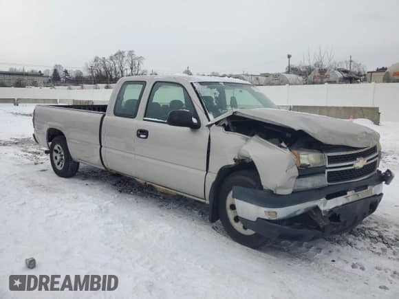 2006 Chevrolet Silverado 1500 LS with VIN 1GCEC19V56E222806, listed as a Copart auction lot 87828765 with 93,317 mi miles and Salvage title. Bid and sale history available at DreamBid. Image 4.