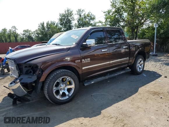 2015 Ram 1500 Laramie z VIN 1C6RR7NT1FS513691, wystawiony jako Copart lot #65722085 z przebiegiem 148 341 mil mil oraz Szkoda całkowita • Salvage title. Historia ofert i sprzedaży dostępna na DreamBid. Obrazek 1.