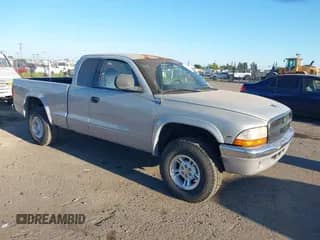 1999 Dodge Dakota SLT with VIN 1B7GG22Y9XS165164, listed as a IAAI auction lot 42904277 with 194,835 mi miles and . Bid and sale history available at DreamBid. Image 1.