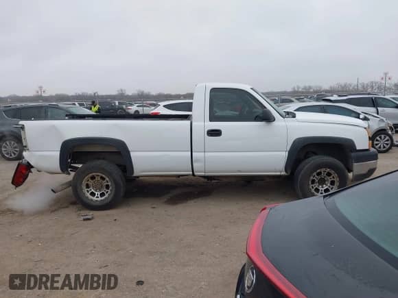 2006 Chevrolet Silverado 2500HD Work Truck z VIN 1GCHC24U06E289959, wystawiony jako IAAI lot #41517741 z przebiegiem 420 852 mil mil oraz . Historia ofert i sprzedaży dostępna na DreamBid. Obrazek 13.