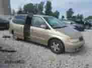 2001 Honda Odyssey EX с VIN 2HKRL18631H570205, выставлен на аукционе Copart как лот 66034725 с пробегом 277 155 миль миль и Списание • Salvage title. История ставок и продаж доступна на DreamBid. Изображение 4.