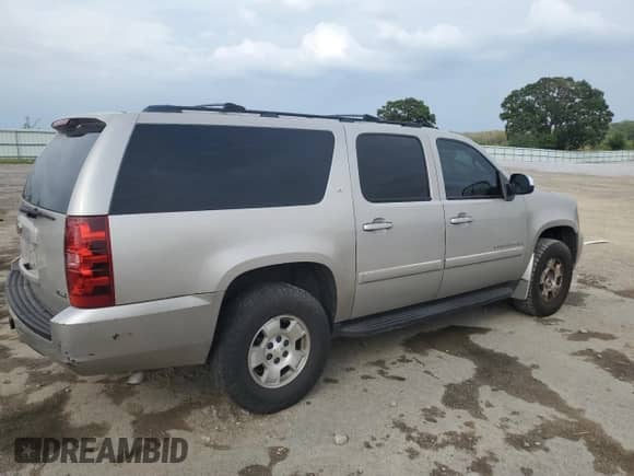 2007 Chevrolet Suburban LTZ с VIN 1GNFC16077R388601, выставлен на аукционе Copart как лот 81522175 с пробегом 162 051 миль миль и Чистый • Clean title. История ставок и продаж доступна на DreamBid. Изображение 3.