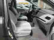 2012 Toyota Sienna LE with VIN 5TDJK3DC7CS045989, listed as a IAAI auction lot 42525117 with 150,919 mi miles and . Bid and sale history available at DreamBid. Image 5.