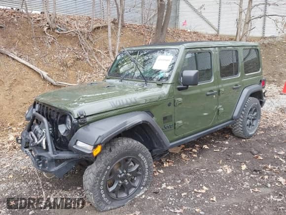 2021 Jeep Wrangler Unlimited Willys with VIN 1C4HJXDNXMW579595, listed as a IAAI auction lot 41930989 with 32,148 mi miles and . Bid and sale history available at DreamBid. Image 2.