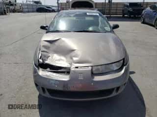 1999 Saturn SC with VIN 1G8ZN1288XZ310351, listed as a Copart auction lot 76677414 with Not provided miles and Salvage title. Bid and sale history available at DreamBid. Image 5.