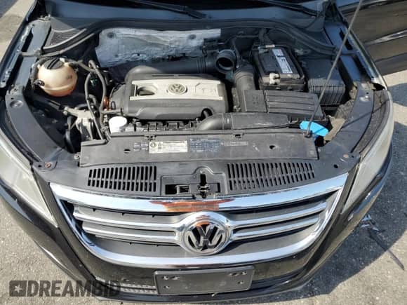 2011 Volkswagen Tiguan S с VIN WVGBV7AX8BW528458, выставлен на аукционе Copart как лот 64525925 с пробегом 147 488 миль миль и Списание • Salvage title. История ставок и продаж доступна на DreamBid. Изображение 12.