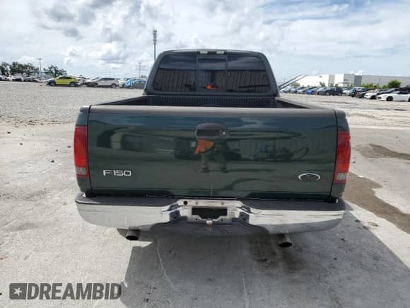 2002 Ford F-150 XL with VIN 1FTRX17262NB49356, listed as a Copart auction lot 81208245 with 183,325 mi miles and Salvage title. Bid and sale history available at DreamBid. Image 6.